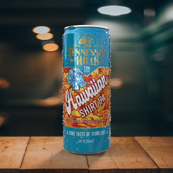 A can of Tennessee Hills Hawaiian Shirt IPA with a colorful label featuring a Hawaiian shirt and tropical imagery.