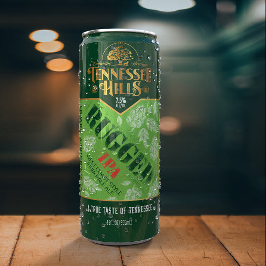 A can of Tennessee Hills Rugged IPA beer on a wooden surface with a blurred background.