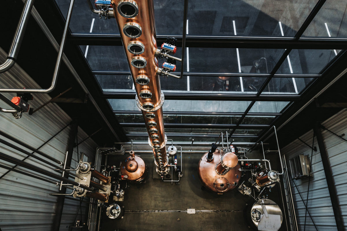 Overhead view of the 50-foot continuous column still and copper pot stills at Tennessee Hills in Bristol, TN
